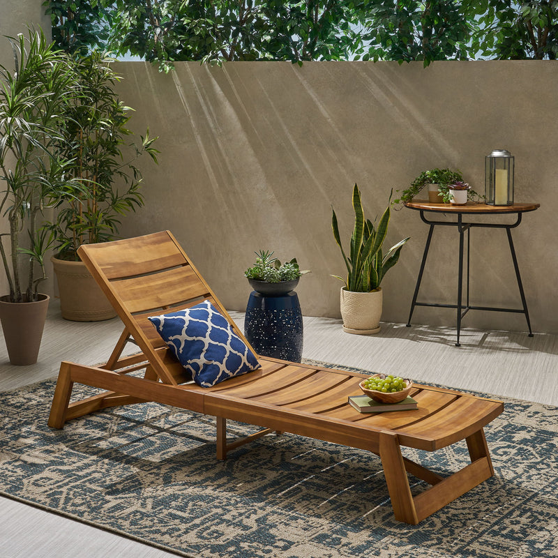 Outdoor Noble House chaise lounge with adjustable seating and slat panel in yellow-brown finish, designed for outdoor relaxation.