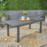 Outdoor expandable dining table with square legs by Noble House, featuring a spacious surface and stylish modern design.