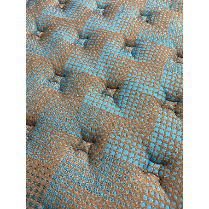 Restonic Comfort Care 13-inch hybrid mattress with plush comfort, showcasing the soft, layered surface and supportive design.