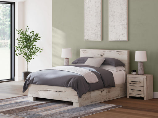 Signature Design by Ashley Lawroy panel bed with built-in storage drawers, featuring a modern wooden frame and sleek design.