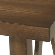 Noble House farmhouse style dining table with a wood-like top, sturdy design, perfect for rustic or casual dining spaces.