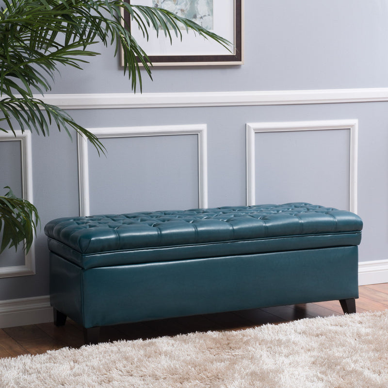 Noble House Juliana storage ottoman with beige fabric cushion and birch wood legs, versatile furniture for living room storage.