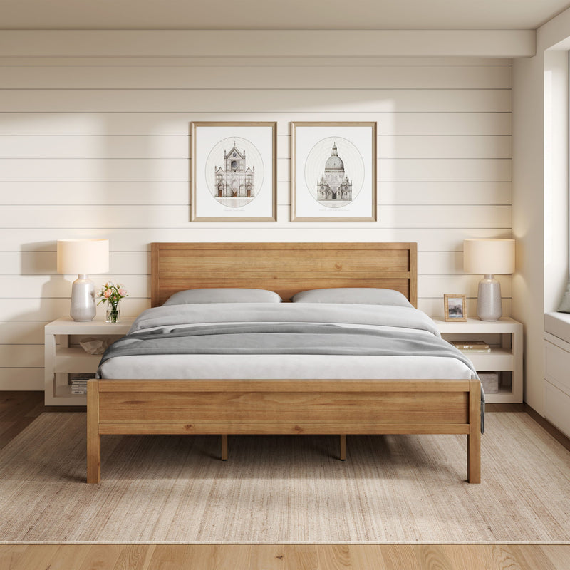 Ridgecrest Home Maddox panel bed with wooden frame and headboard, shown in a modern bedroom setting.