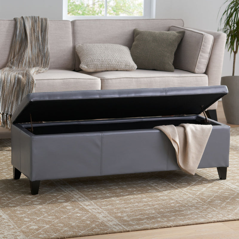 Contemporary Noble House Glouster storage ottoman with soft fabric upholstery and a spacious interior for versatile storage.