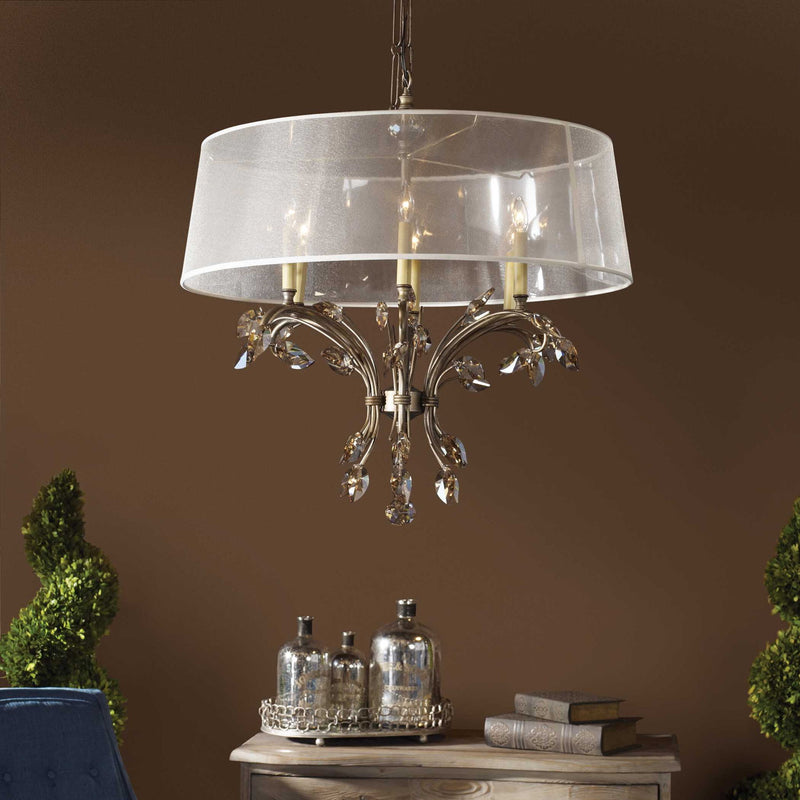Uttermost Alenya 6-light gold chandelier with curved shades, hanging from a decorative ceiling mount, elegant and modern lighting fixture.