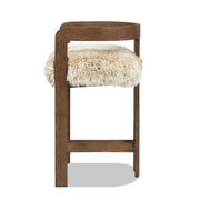 Jennifer Taylor Home Millwick low back counter stool with wooden legs and upholstered seat, suitable for counter height dining.