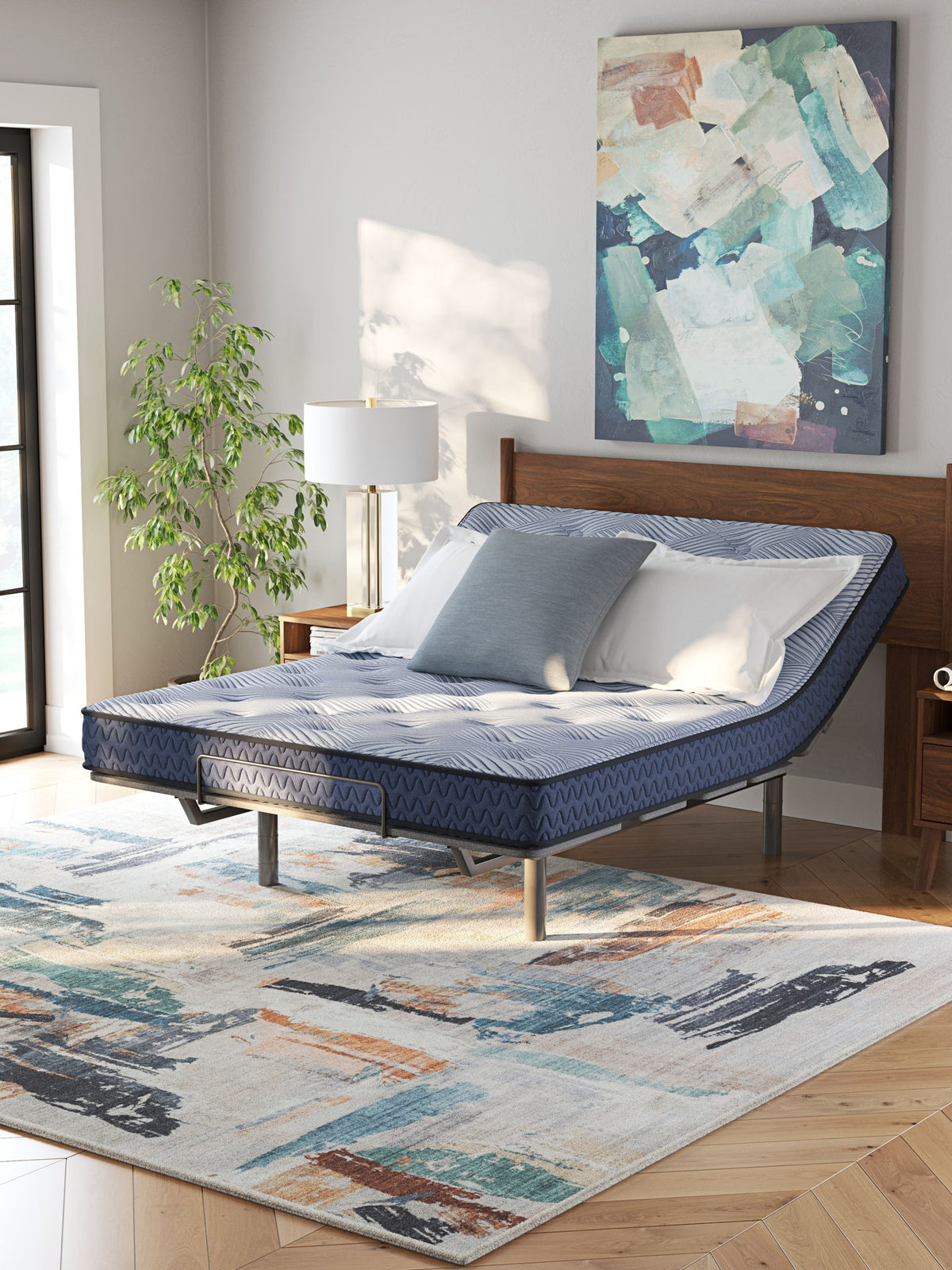 Sierra Sleep® by Ashley Peak 2.0 Bonnell hybrid mattress showing plush fabric cover and supportive structure.
