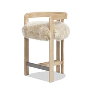 Jennifer Taylor Home Millwick low back counter stool with wood legs and cushioned seat, suitable for 24-27 inch counter height.