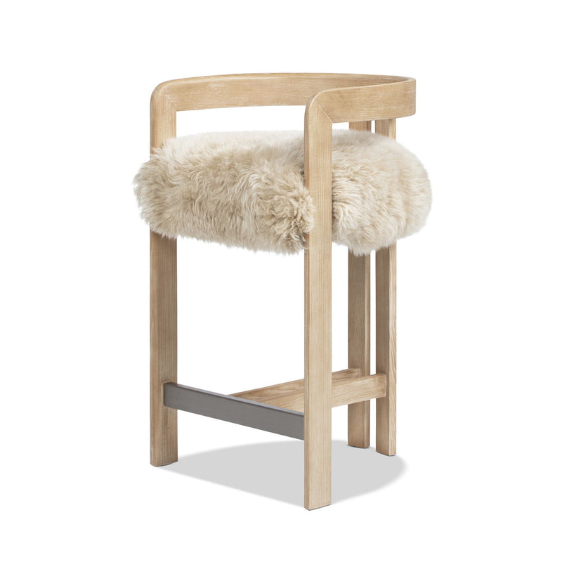 Jennifer Taylor Home Millwick low back counter stool with wood legs and cushioned seat, suitable for 24-27 inch counter height.