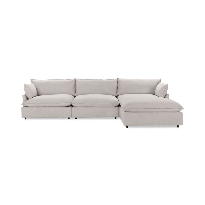 Classic Home Caplan modular sectional showing beige fabric with plush cushions and a modern design in a living room setting.