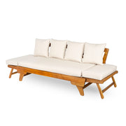Noble House outdoor patio daybed sofa with three seats, foldable arms, and four back pillows on a patio setting.