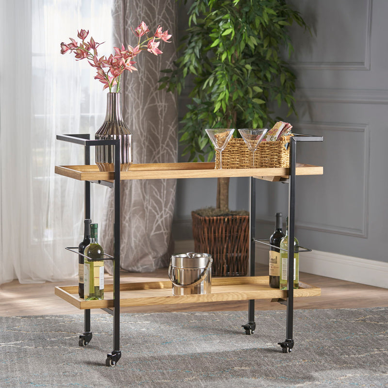 Noble House modern industrial bar cart with shelving, casters, and metal frame, perfect for stylish home bar or serving space.
