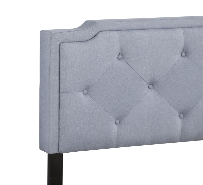 Button tufted upholstered bed from Glory Furniture, showcasing a cozy, elegant design with plush fabric and tufted headboard.
