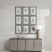 Set of 9 farmhouse floral framed prints by Uttermost featuring black frames and vibrant floral artwork.