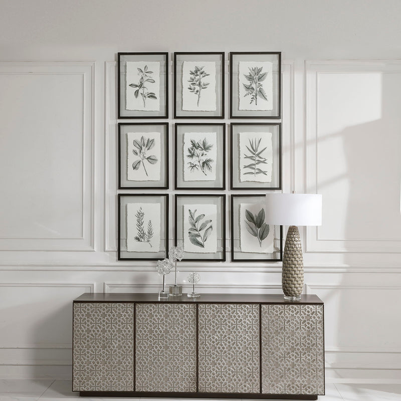 Set of 9 farmhouse floral framed prints by Uttermost featuring black frames and vibrant floral artwork.