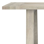 Simpli-Home Whitley dining table with wooden surface and sturdy legs, ideal for modern dining rooms.