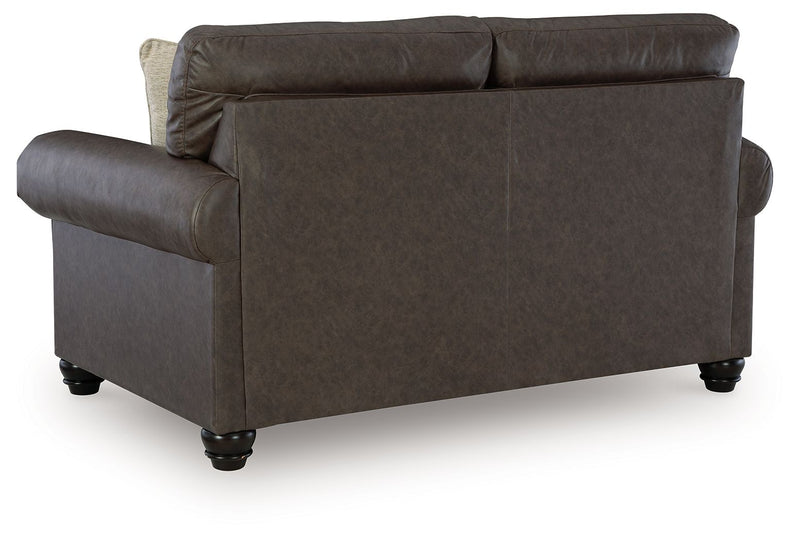 Benchcraft Roxmere living room set with stationary chair and matching ottoman in a cozy, modern fabric design.