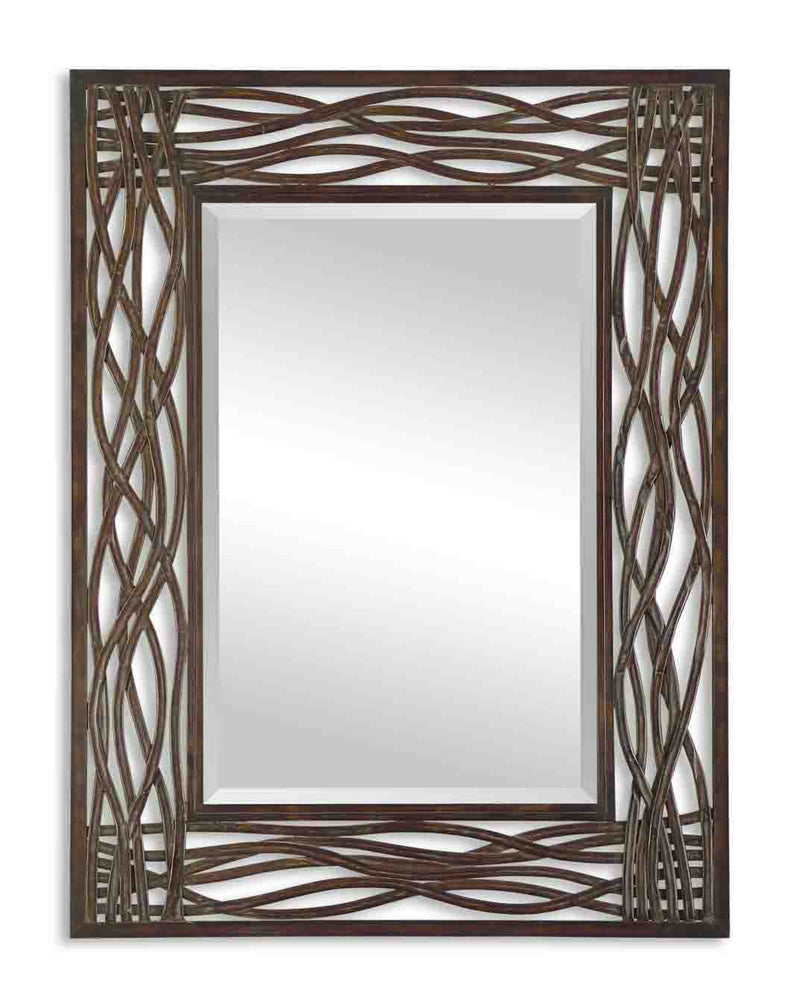 Uttermost Dorigrass metal wall mirror with a brown finish, featuring a circular design and modern aesthetic for stylish wall decor.