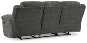 Signature Design by Ashley Frohn reclining sofa and loveseat set in neutral fabric, featuring plush cushions and reclining features.