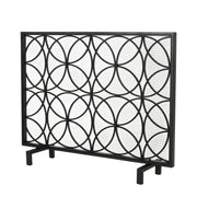 Noble House Thayer single panel iron fireplace screen with a geometric design, featuring black metal and decorative cutouts.