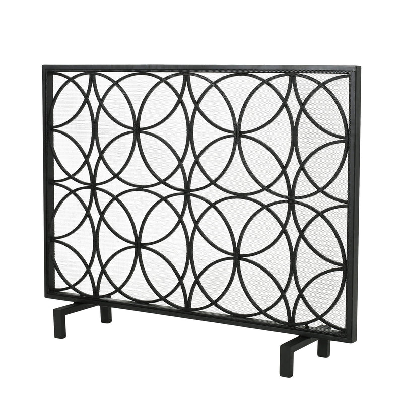 Noble House Thayer single panel iron fireplace screen with a geometric design, featuring black metal and decorative cutouts.