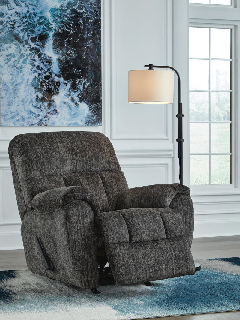 Signature Design by Ashley Stayfish rocker recliner with plush fabric and cushioned armrests, perfect for relaxing comfort.