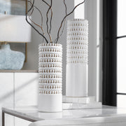 Set of two white Angelou vases by Uttermost, elegant ceramic vases with smooth finish, perfect for decorative displays.