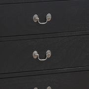 Elegant black dresser from Glory Furniture featuring polished wood finish and classic design, ideal for bedroom storage.