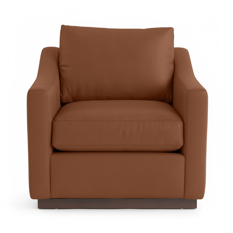 Classic Home Aspen accent arm chair with plush upholstery and wooden legs in a cozy, stylish living room setting.