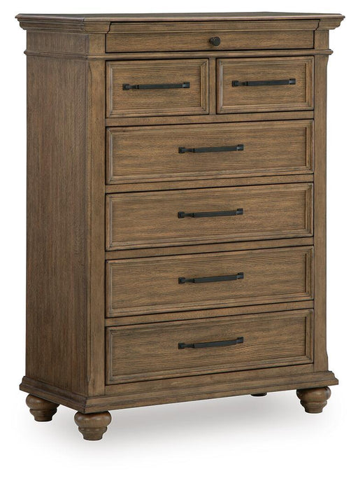 Medium brown Karallin seven drawer accent chest by Signature Design Ashley, showcasing a stylish storage piece with sleek drawer handles.