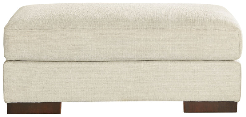 Signature Design by Ashley Maggie upholstered ottoman with plush fabric and a modern, versatile design for living room decor.