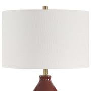 Uttermost gourd-shaped table lamp with textured ceramic base and fabric shade, ideal for modern home decor.