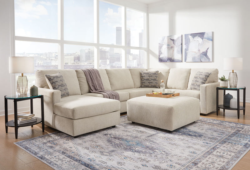 Signature Design by Ashley Edenfield 4-piece living room set with sofa, loveseat, and chairs in a modern living space.