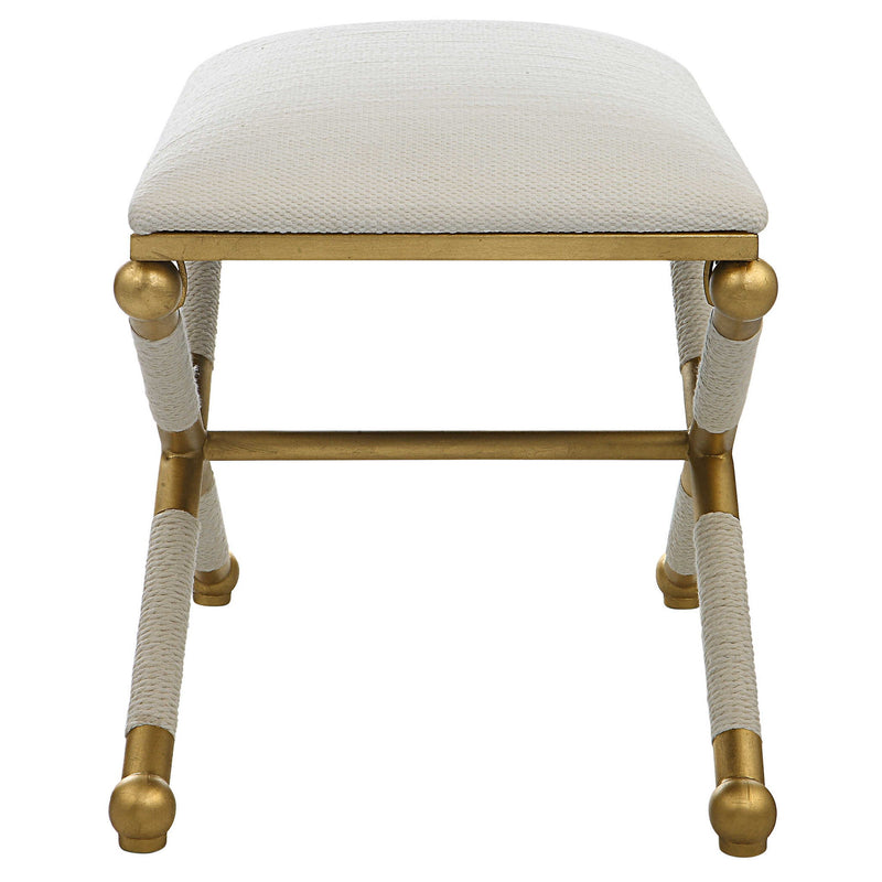 Uttermost Socialite small beige accent bench with wooden legs, ideal for entryways or living room decor.