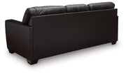 Midnight Queen Sleeper Sofa by Signature Design Ashley, featuring plush fabric, clean lines, and convertible sleep function.
