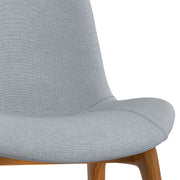 Set of two Loretta upholstered dining chairs by Simpli-Home featuring cushioned seats and fabric upholstery in a modern design.