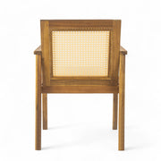 Noble House Preston outdoor dining chair set with teak frames and beige cushions, two chairs shown for patio or garden use.