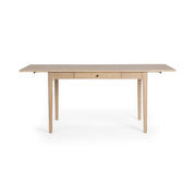 Classic Home Karl extendable writing desk in coastal drift finish with sleek, modern design and adjustable length for versatile workspace.