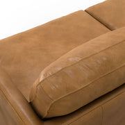 Livingston upholstered stationary sofa by Simpli-Home featuring plush fabric and cushioned armrests in a modern living room setting.