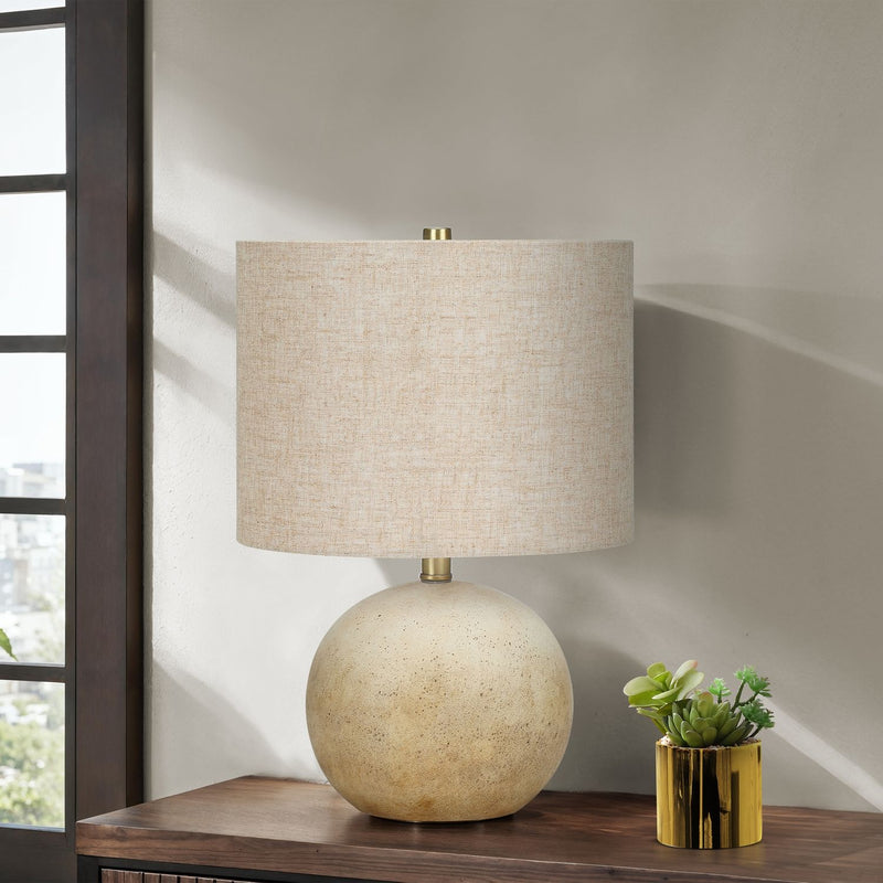 8th Street table lamp with a modern design, featuring a sleek base and fabric shade, ideal for home or office lighting.