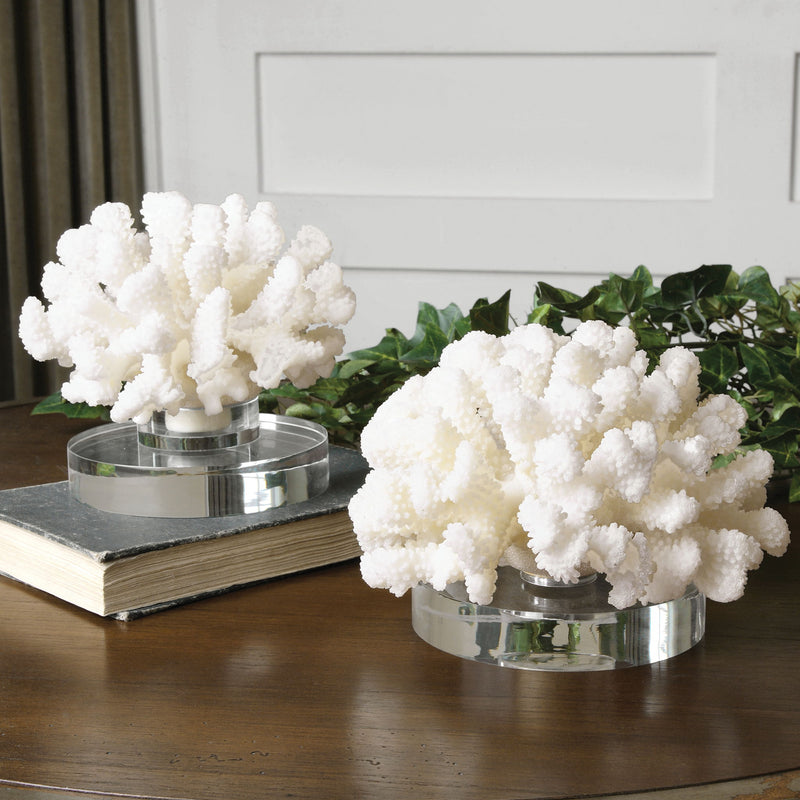 Set of two white hard coral sculptures by Uttermost, decorative sculptures and figurines for coastal or ocean-inspired decor.