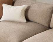 Classic Home Adalynne stationary sectional sofa with plush cushions and modern design, shown in a spacious living room setting.
