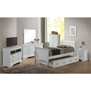 Elegant Glory Furniture trundle bed with a classic design, featuring a sturdy frame and a hidden pull-out mattress for versatile sleeping space.