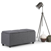 Avalon - Upholstered Storage Ottoman - R&R Furniture Gallery (Fountain Valley, CA)