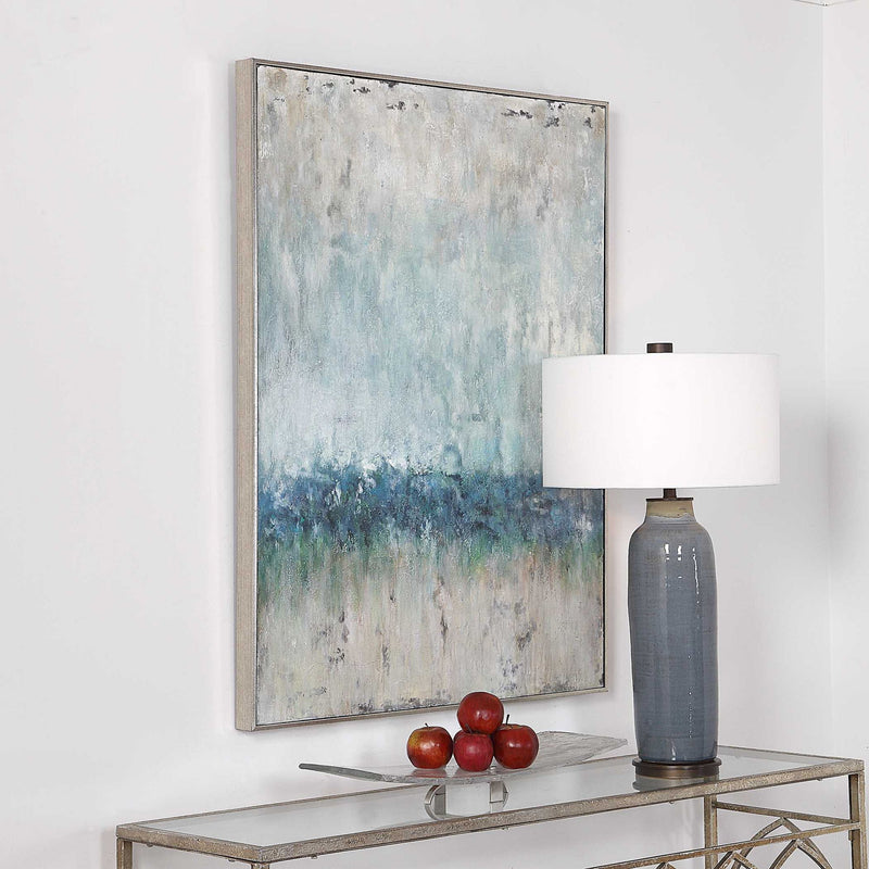 Blue abstract canvas art titled "Tidal Wave" by Uttermost featuring swirling wave patterns in vibrant shades of blue.