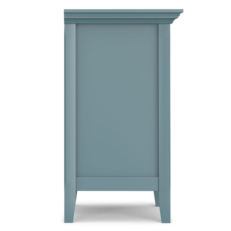 Handcrafted Amherst bedside table by Simpli-Home with a wooden finish, featuring a single drawer and open shelf for bedroom storage.