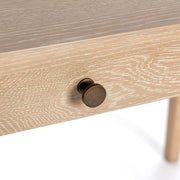Classic Home Karl extendable writing desk in Coastal Drift finish, showing the sleek, modern design with adjustable extension panels.