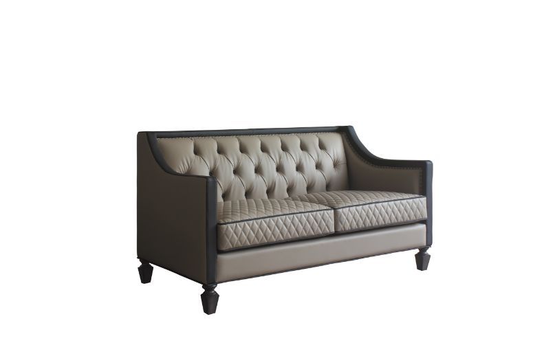 House Beatrice - Loveseat With 3 Pillows - Tan Synthetic Leather , Black Synthetic Leather & Charcoal - R&R Furniture Gallery (Fountain Valley, CA)
