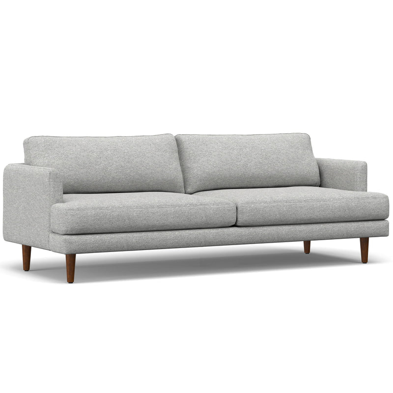 Livingston upholstered stationary sofa by Simpli-Home with plush cushions and fabric upholstery in a modern living room setting.