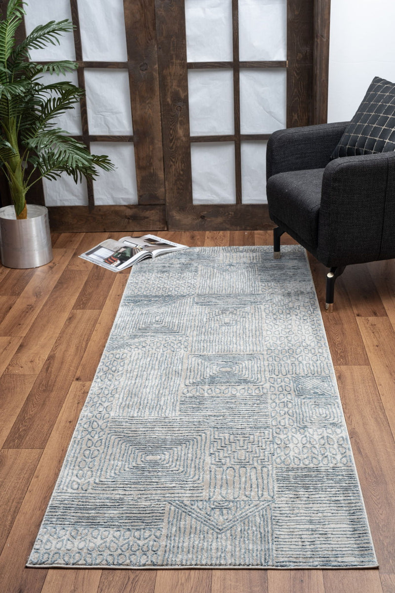 Elegance - 5'3" X 7'3" Area Rug - Blue - R&R Furniture Gallery (Fountain Valley, CA)